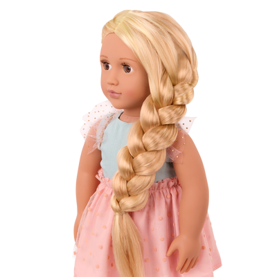 Poppy hair styling doll with a book and colored extentions and accessories